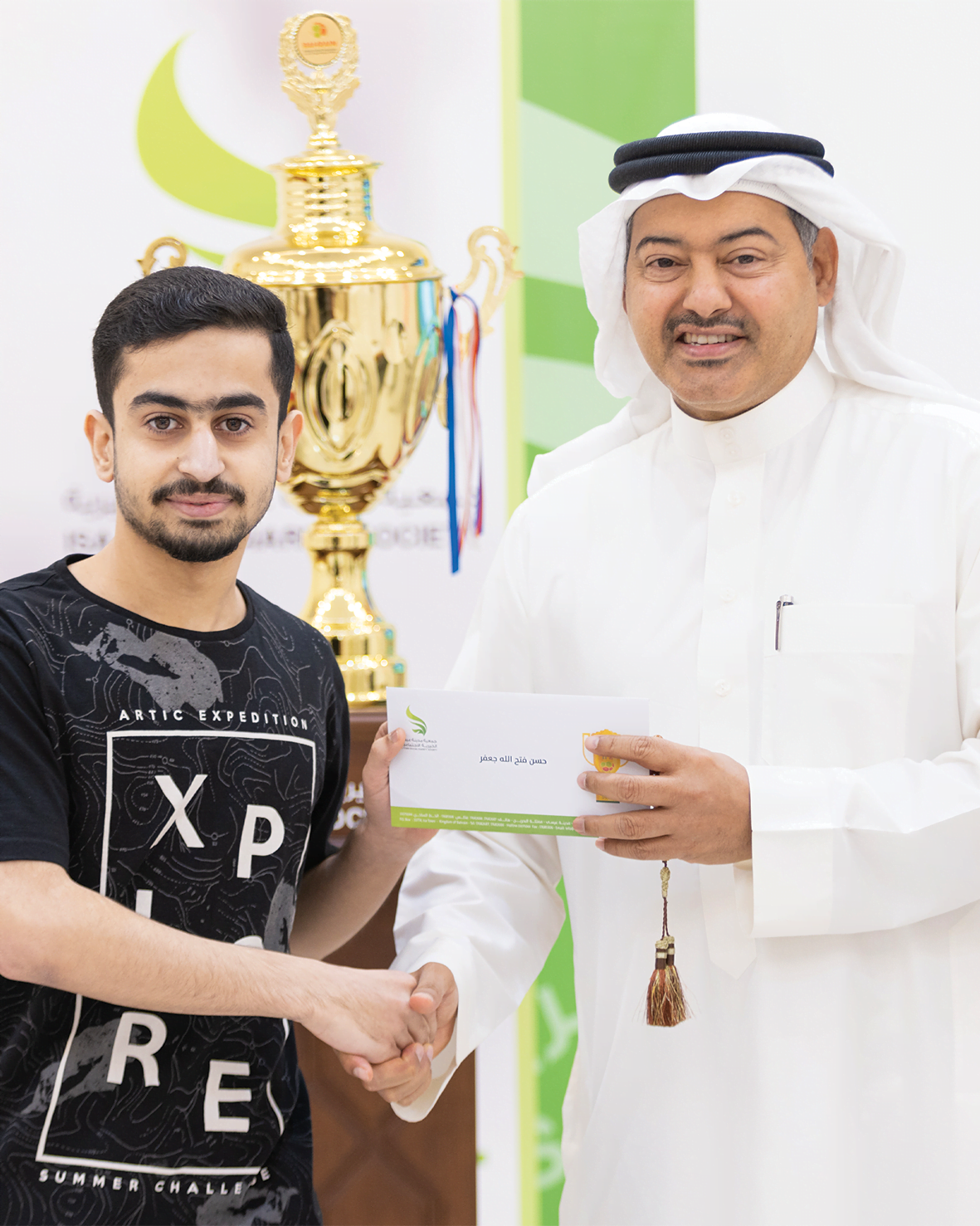 بمناسبة احرازهم المركز الأول في البطولة البحرينية الخيرية السابعة لكرة القدم